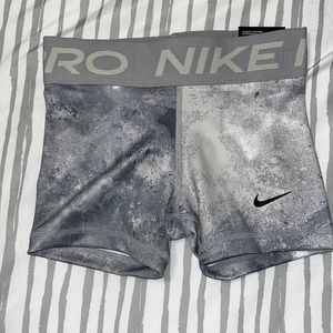 Gray patterned Nike pro shorts